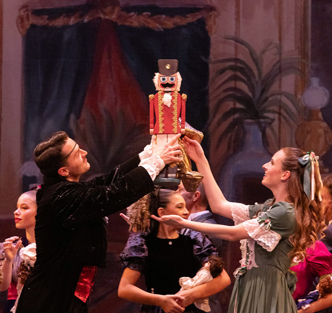Clara and Drosselmeyer dancing with the Nutcracker