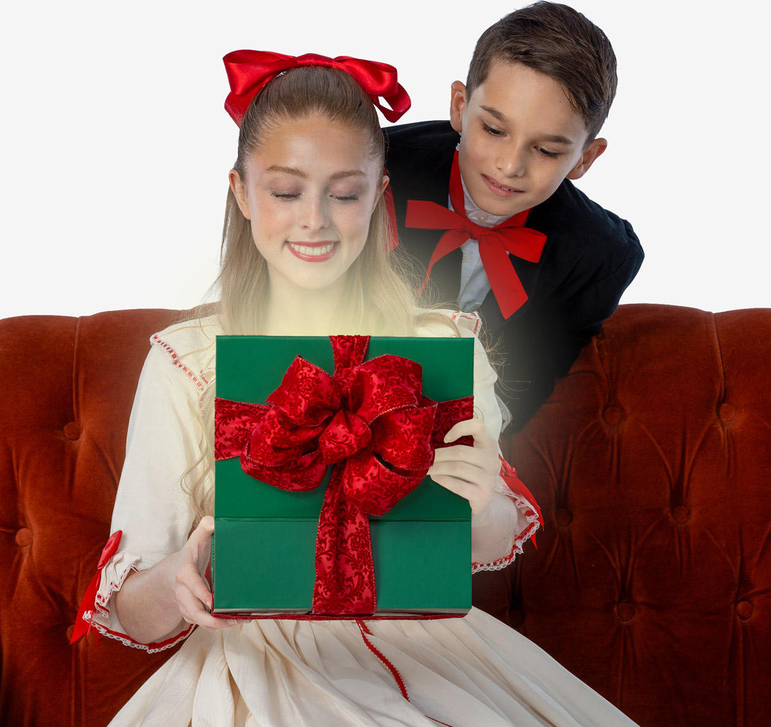 Children opening a Christmas gift